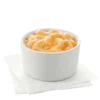A bowl of Chick-fil-A mac and cheese on a white napkin.